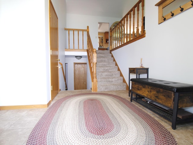 237 Plainview Dr, Troy Twp, WI 54022 - stairs featuring tile patterned flooring