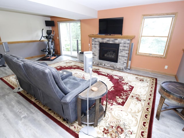 237 Plainview Dr, Troy Twp, WI 54022 - living area with a fireplace and wood finished floors