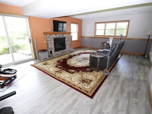 237 Plainview Dr, Troy Twp, WI 54022 - living area featuring wood finished floors and a fireplace
