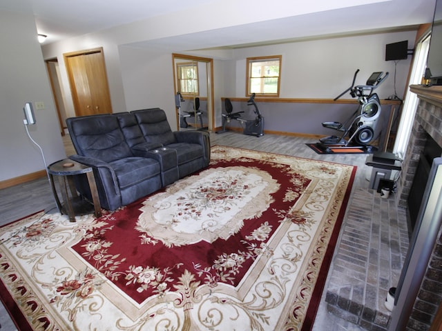 237 Plainview Dr, Troy Twp, WI 54022 - living area with a brick fireplace and baseboards