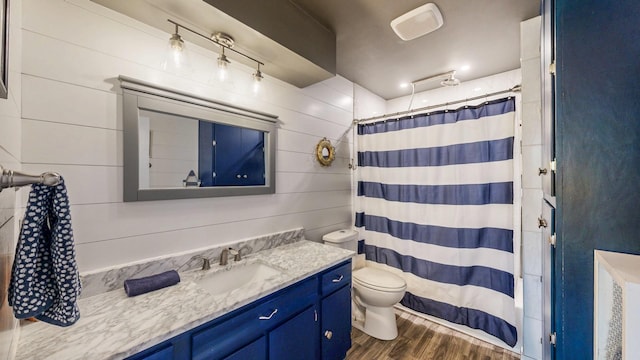 236 Alleghany Ave, Wabasha, MN 55981 - bathroom with wood finished floors, vanity, and a shower with curtain