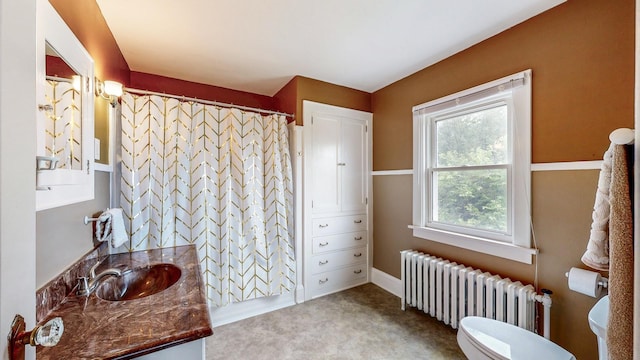 236 Alleghany Ave, Wabasha, MN 55981 - bathroom with radiator, vanity, and a shower with shower curtain