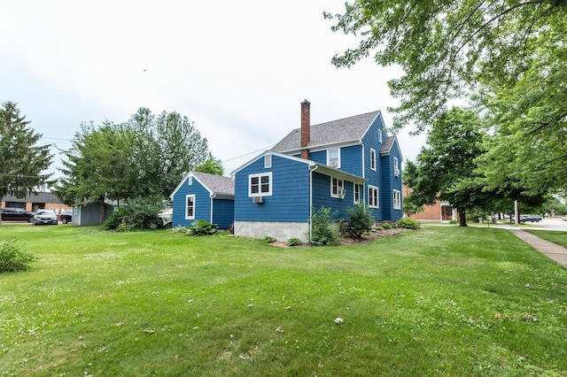 236 Alleghany Ave, Wabasha, MN 55981 - view of side of property with a chimney and a yard