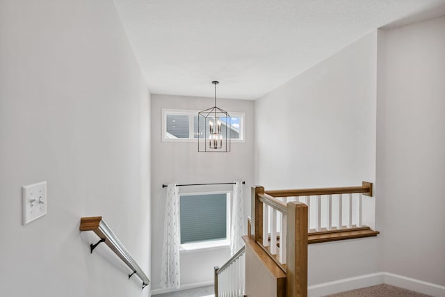 14221 Aspen Ave, Rosemount, MN 55068 - stairs with a chandelier and carpet