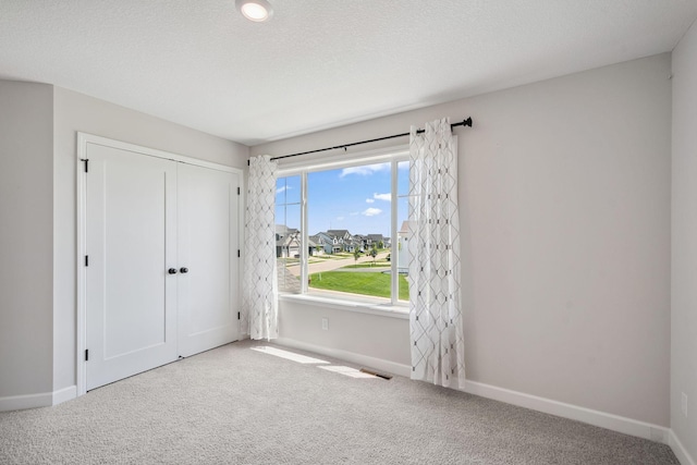 14221 Aspen Ave, Rosemount, MN 55068 - unfurnished bedroom featuring carpet and a closet