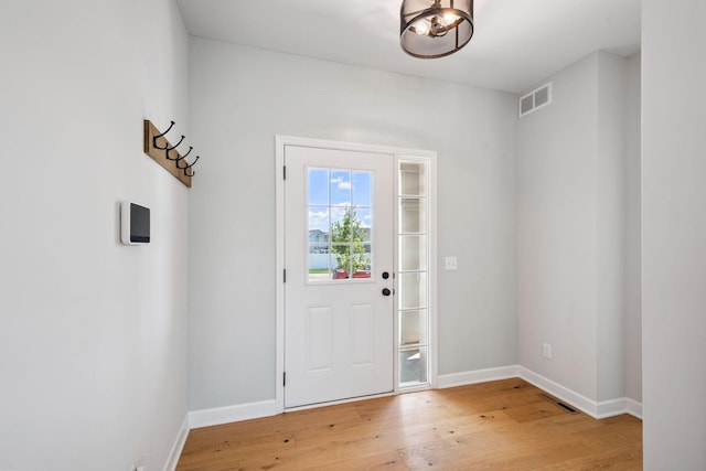 14221 Aspen Ave, Rosemount, MN 55068 - foyer entrance featuring light wood-style flooring and baseboards