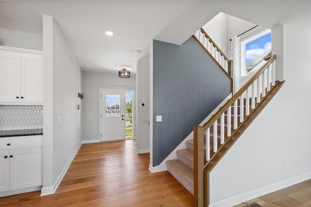14221 Aspen Ave, Rosemount, MN 55068 - entryway featuring stairs, light wood-style flooring, and recessed lighting