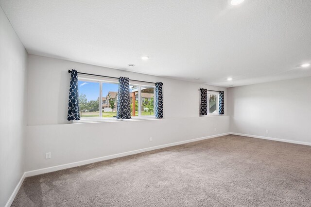 14221 Aspen Ave, Rosemount, MN 55068 - empty room with carpet floors, healthy amount of natural light, and recessed lighting