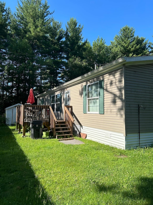 26750 Half Circle Ct Unit 6, Wyoming, MN 55092 - rear view of house with a lawn and a wooden deck