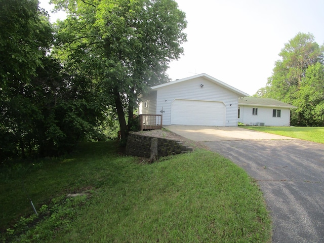32468 County Highway 27, Elizabeth Twp, MN 56534 - ranch-style house with asphalt driveway and a front yard