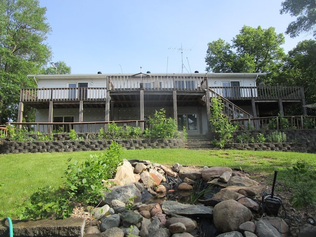32468 County Highway 27, Elizabeth Twp, MN 56534 - back of house with a wooden deck, a yard, and stairs