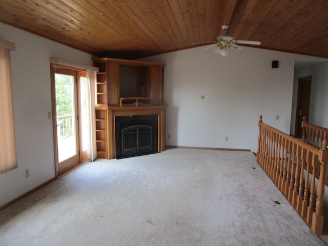 32468 County Highway 27, Elizabeth Twp, MN 56534 - unfurnished living room with wooden ceiling, ceiling fan, carpet flooring, a fireplace, and vaulted ceiling