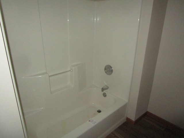 32468 County Highway 27, Elizabeth Twp, MN 56534 - full bath with wood finished floors and shower / washtub combination