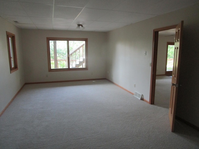 32468 County Highway 27, Elizabeth Twp, MN 56534 - unfurnished room with carpet flooring, healthy amount of natural light, and a drop ceiling