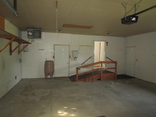 32468 County Highway 27, Elizabeth Twp, MN 56534 - garage featuring a garage door opener and a heating unit