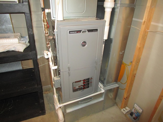 32468 County Highway 27, Elizabeth Twp, MN 56534 - utility room featuring heating unit