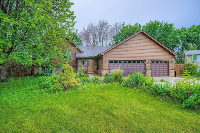 8210 208th St W, Lakeville, MN 55044 - view of front of property with an attached garage, stone siding, and driveway