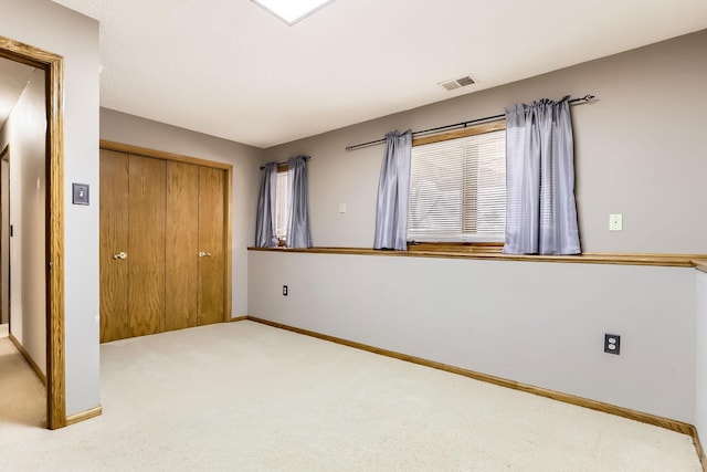 8210 208th St W, Lakeville, MN 55044 - unfurnished bedroom featuring carpet flooring and a closet