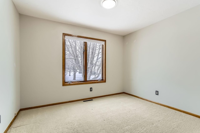 8210 208th St W, Lakeville, MN 55044 - spare room featuring light colored carpet and baseboards