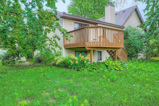 8210 208th St W, Lakeville, MN 55044 - back of property featuring stairs, a deck, and a chimney
