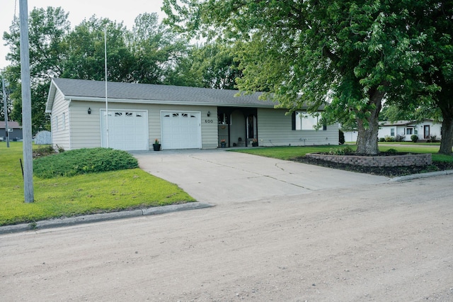 600 Venn St, Sherburn, MN 56171 - ranch-style house featuring an attached garage, driveway, and a front yard