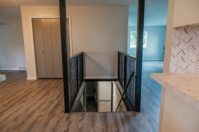 600 Venn St, Sherburn, MN 56171 - stairway with wood finished floors and baseboards