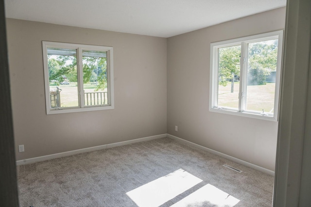 600 Venn St, Sherburn, MN 56171 - carpeted spare room with plenty of natural light