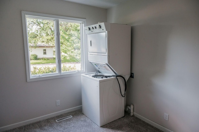600 Venn St, Sherburn, MN 56171 - washroom with stacked washer / drying machine and light carpet