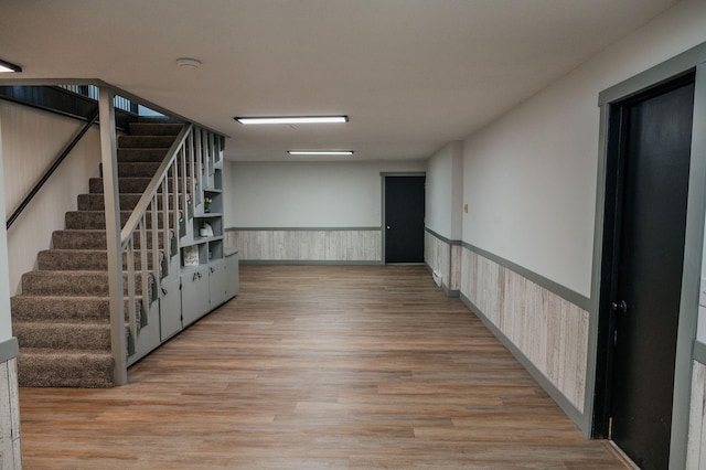 600 Venn St, Sherburn, MN 56171 - basement with stairs, wood finished floors, and a wainscoted wall