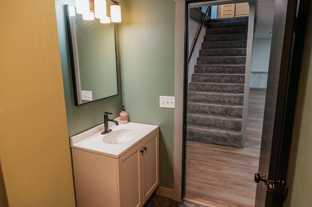 600 Venn St, Sherburn, MN 56171 - bathroom featuring vanity and wood finished floors