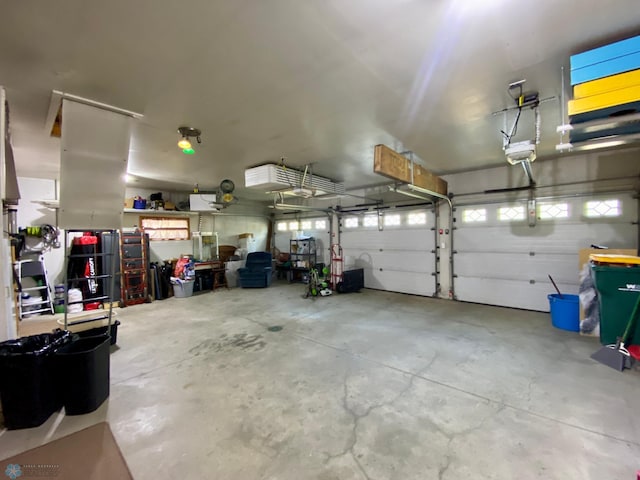 1506 Woodridge Ln, West Fargo, ND 58078 - garage featuring a garage door opener