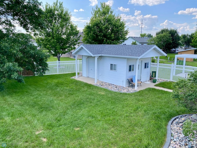 1506 Woodridge Ln, West Fargo, ND 58078 - fenced backyard featuring an outbuilding