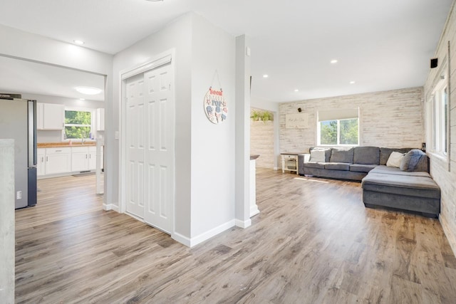 605 Central Ave SW, Cambridge, MN 55008 - living area featuring plenty of natural light, light wood-style flooring, and recessed lighting