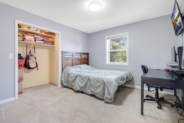 605 Central Ave SW, Cambridge, MN 55008 - bedroom with light carpet, a closet, and a desk