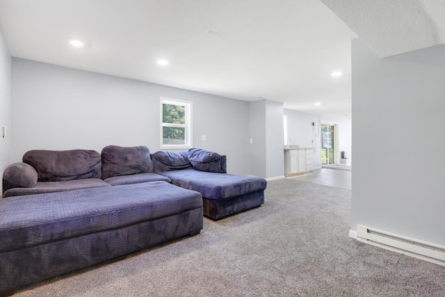 605 Central Ave SW, Cambridge, MN 55008 - carpeted living area featuring recessed lighting and a baseboard heating unit