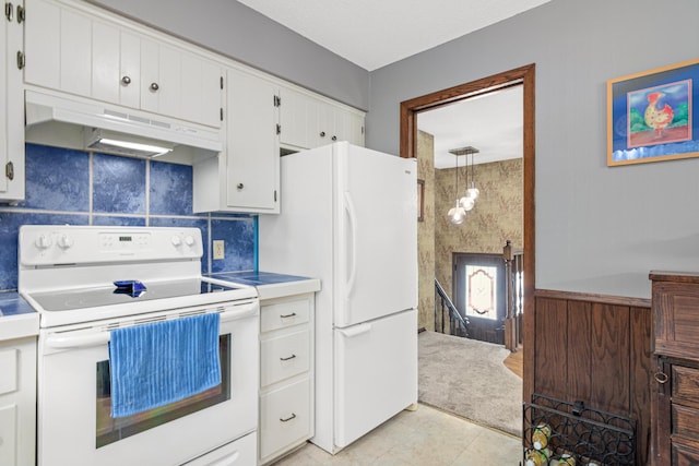 6670 Maple Dr, Rockford, MN 55373 - kitchen featuring white appliances, under cabinet range hood, white cabinets, light countertops, and tasteful backsplash