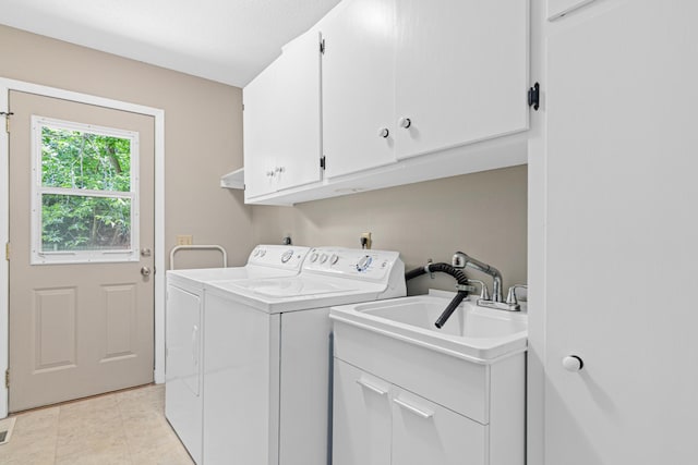 6670 Maple Dr, Rockford, MN 55373 - washroom with cabinet space, washing machine and dryer, and light tile patterned floors