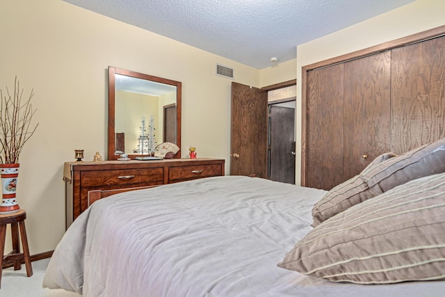 6670 Maple Dr, Rockford, MN 55373 - carpeted bedroom with a textured ceiling