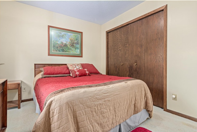 6670 Maple Dr, Rockford, MN 55373 - bedroom featuring light colored carpet and a closet