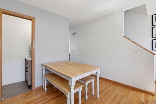 13066 Crimson Clover Ln, Eden Prairie, MN 55347 - dining room with light wood-style flooring and baseboards