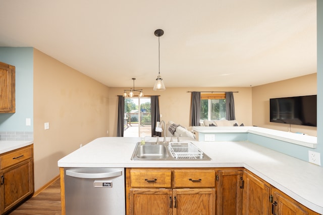 10815 Matthew Dr, Chisago City, MN 55013 - kitchen with dishwasher, open floor plan, light countertops, and wood finished floors