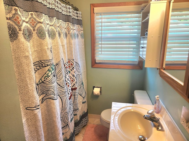 1302 Clark St, Albert Lea, MN 56007 - bathroom featuring healthy amount of natural light, tile patterned flooring, and curtained shower