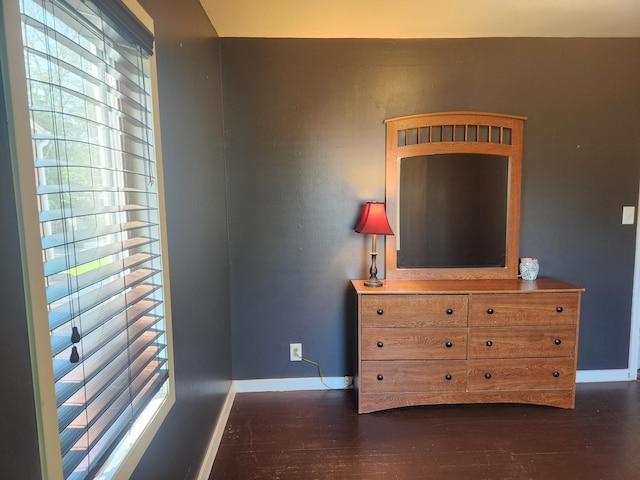 1302 Clark St, Albert Lea, MN 56007 - bedroom featuring baseboards and dark wood-style floors
