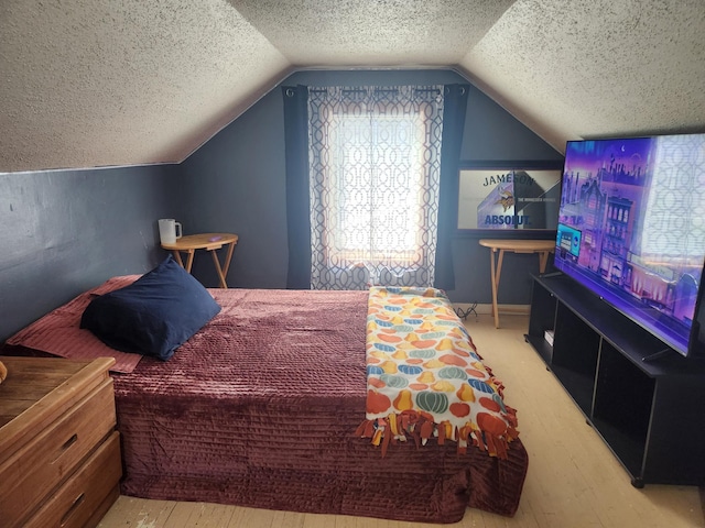 1302 Clark St, Albert Lea, MN 56007 - bedroom with a textured ceiling, wood-type flooring, and vaulted ceiling