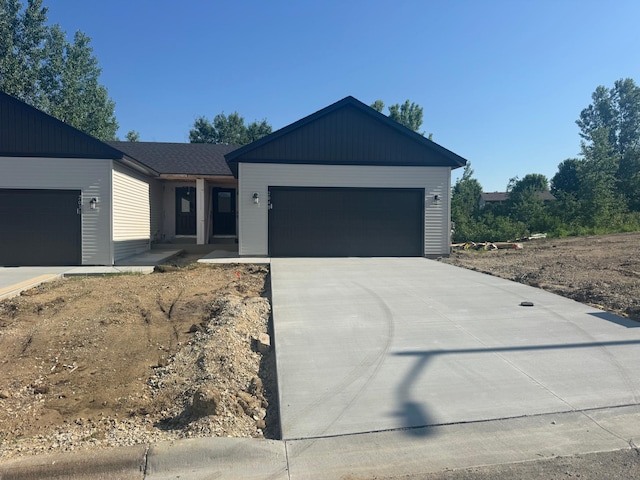 2049 20th St E, Zumbrota, MN 55992 - ranch-style house with an attached garage and concrete driveway