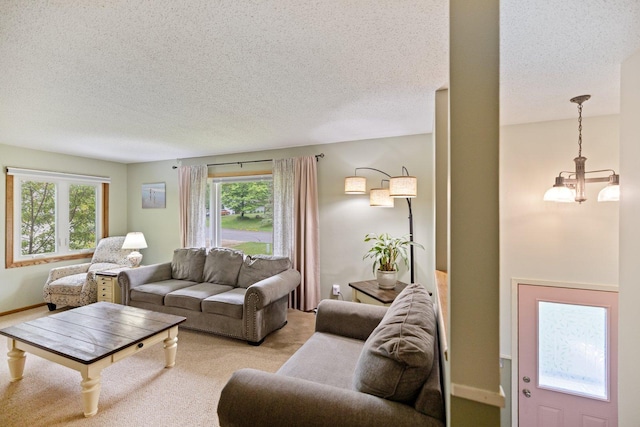 1902 3rd Ave, Grand Rapids, MN 55744 - living room with a textured ceiling and carpet floors