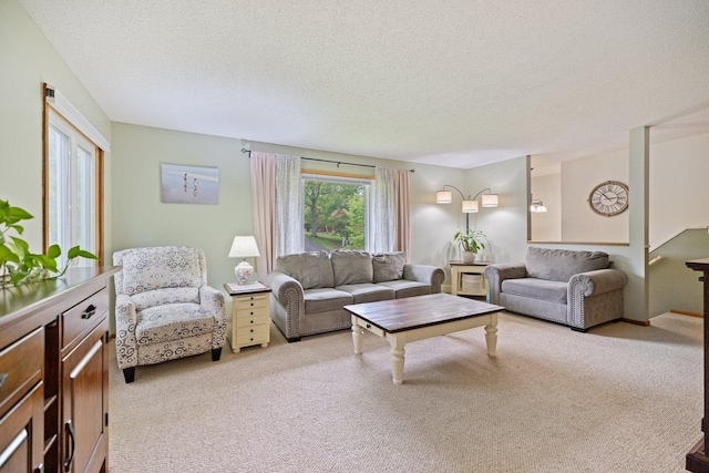 1902 3rd Ave, Grand Rapids, MN 55744 - living room with light carpet and a textured ceiling