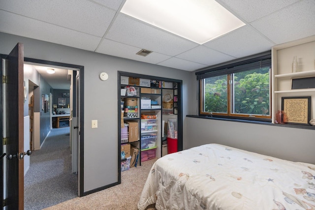 1902 3rd Ave, Grand Rapids, MN 55744 - carpeted bedroom with a paneled ceiling and a closet