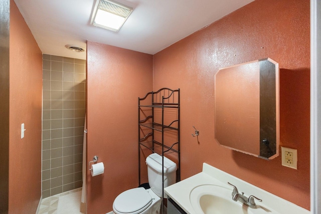 1902 3rd Ave, Grand Rapids, MN 55744 - bathroom with vanity and a textured wall