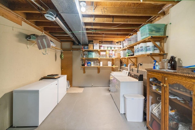1902 3rd Ave, Grand Rapids, MN 55744 - unfinished basement featuring washing machine and clothes dryer and fridge